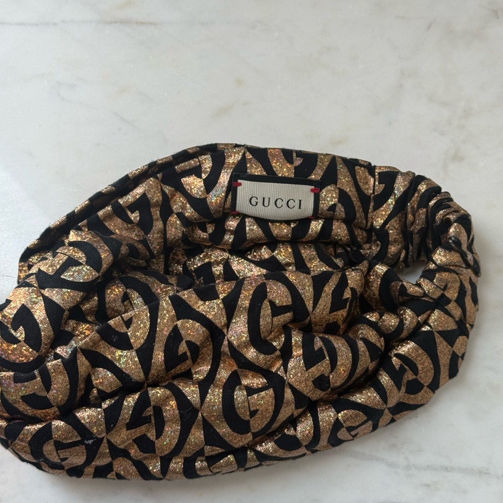 Gucci Glittering Black and Gold Logo Headband (Pre-owned)